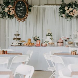 Wedding details of tables wedding cake and desserts including donuts