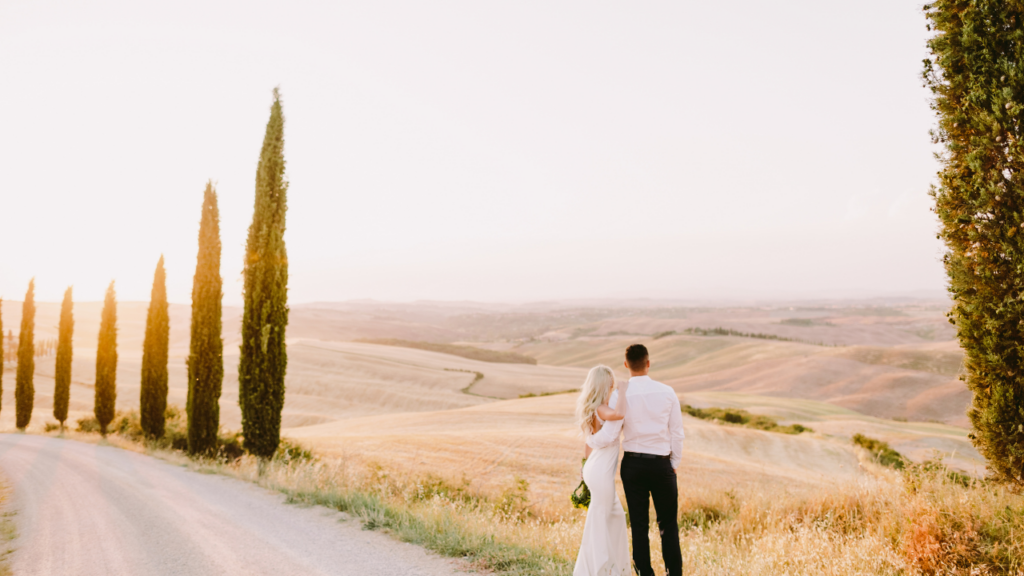 vnv events: Couple gazing at the horizon, satisfied with the success of their destination wedding.