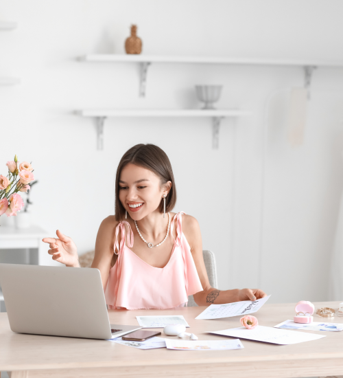 vnv events: Female Wedding Planner researching vendors in Office