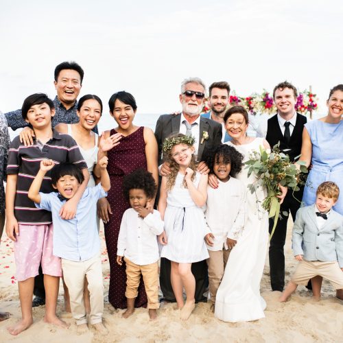 Happy friends and family at a wedding party